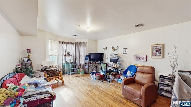 129-131 Seymour Ave, Newark, NJ 07108 - living area with wood finished floors and an office area