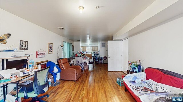 129-131 Seymour Ave, Newark, NJ 07108 - living area featuring wood finished floors