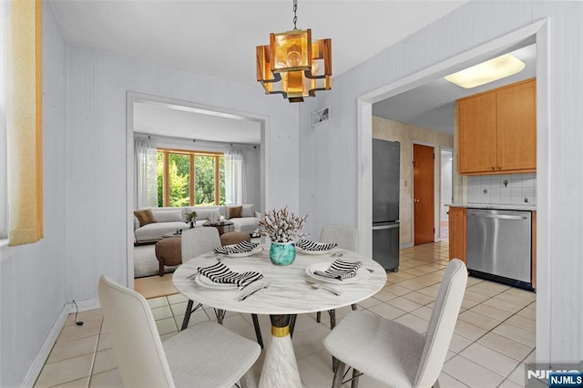9 Rutan Pl, Bloomfield, NJ 07003 - dining area featuring light tile patterned flooring and a chandelier
