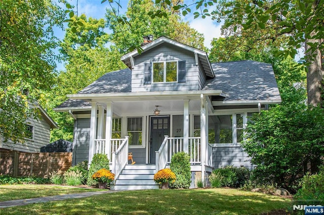 27 Nassau Rd, Montclair, NJ 07043 - bungalow-style home with covered porch, a chimney, and a shingled roof