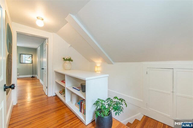 27 Nassau Rd, Montclair, NJ 07043 - hall with light wood finished floors, baseboards, and lofted ceiling