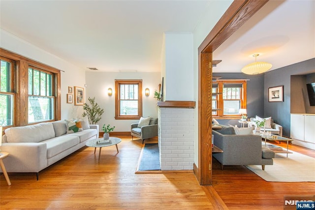 27 Nassau Rd, Montclair, NJ 07043 - living room featuring plenty of natural light and light wood-style floors