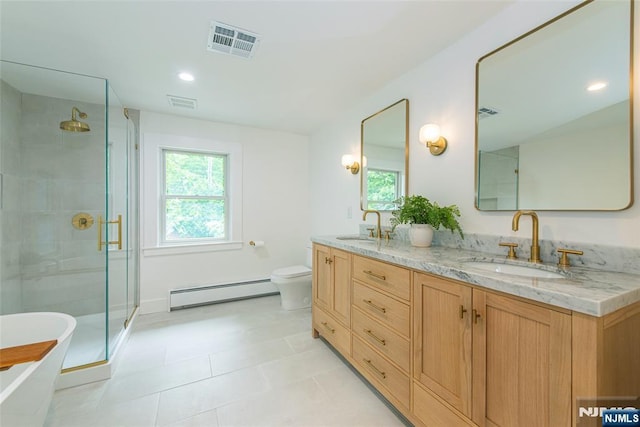 27 Nassau Rd, Montclair, NJ 07043 - full bath featuring a baseboard heating unit, double vanity, plenty of natural light, a stall shower, and recessed lighting