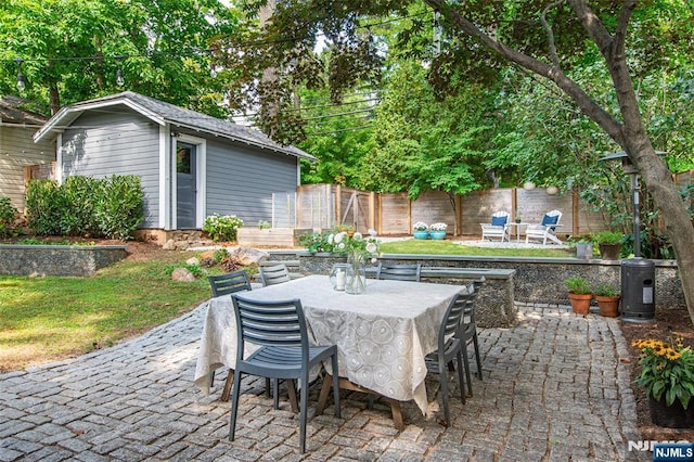 27 Nassau Rd, Montclair, NJ 07043 - view of patio with outdoor dining area and an outdoor structure