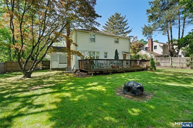 12 Louise Ln, Tenafly, NJ 07670 - back of property featuring a wooden deck