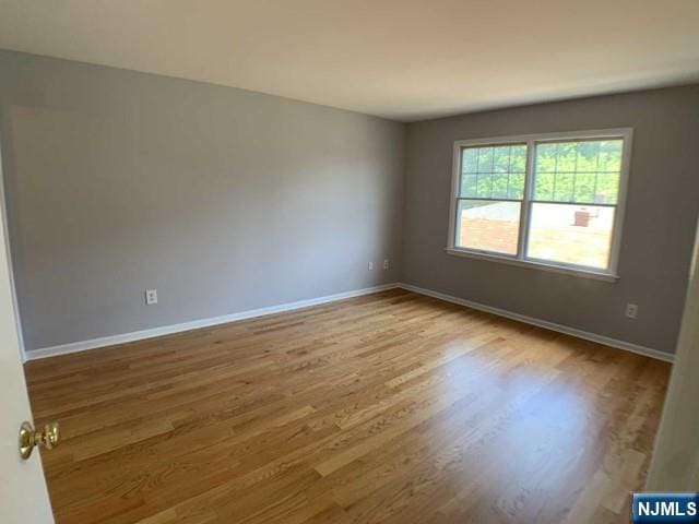 18 Prospect St Unit 4, Palisades Park, NJ 07650 - unfurnished room with wood finished floors and baseboards