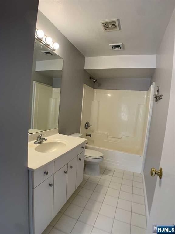 18 Prospect St Unit 4, Palisades Park, NJ 07650 - full bath featuring tile patterned flooring, vanity, toilet, and shower / tub combination