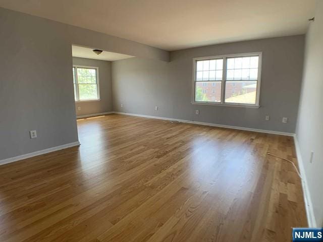 18 Prospect St Unit 4, Palisades Park, NJ 07650 - spare room with wood finished floors and baseboards