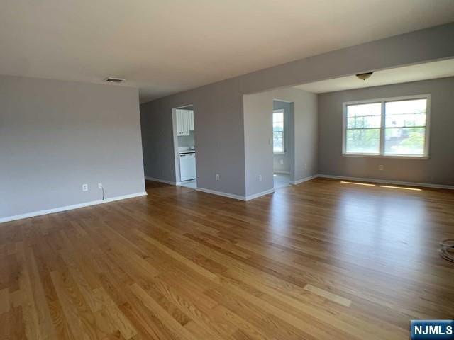 18 Prospect St Unit 4, Palisades Park, NJ 07650 - empty room with wood finished floors and baseboards