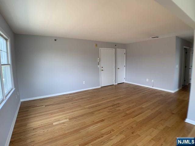 18 Prospect St Unit 4, Palisades Park, NJ 07650 - spare room featuring baseboards and light wood finished floors