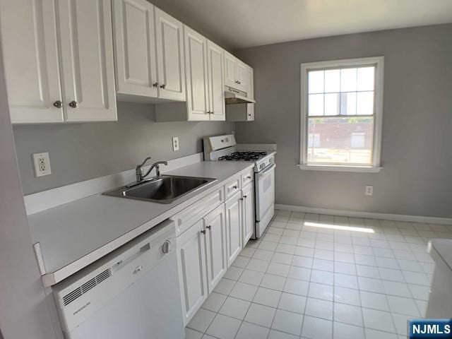 18 Prospect St Unit 4, Palisades Park, NJ 07650 - kitchen with white appliances, a sink, under cabinet range hood, light countertops, and white cabinets