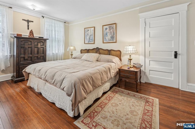 74 Oakdene Ave, Cliffside Park, NJ 07010 - bedroom with hardwood / wood-style floors, crown molding, and baseboards