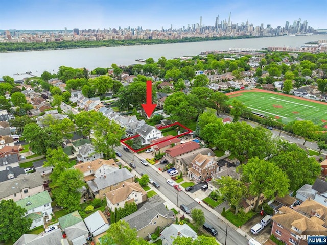74 Oakdene Ave, Cliffside Park, NJ 07010 - aerial perspective of suburban area featuring skyline, a nearby body of water, and property parcel outlined