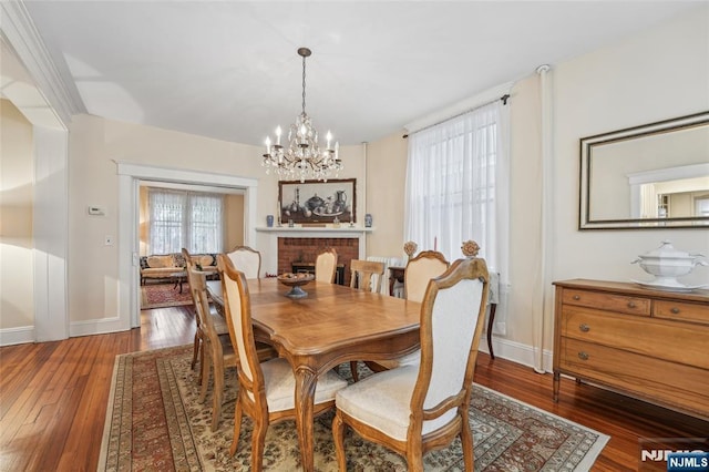 74 Oakdene Ave, Cliffside Park, NJ 07010 - dining space featuring a chandelier, baseboards, and wood-type flooring