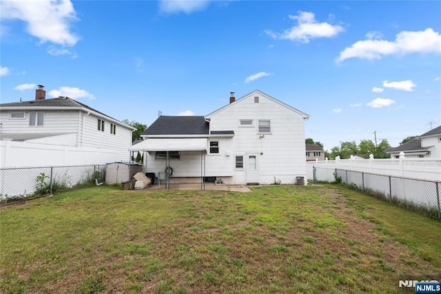 3 Gregory Ter, Belleville, NJ 07109 - back of property featuring a patio and a chimney
