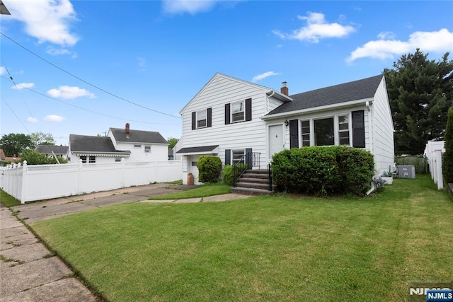3 Gregory Ter, Belleville, NJ 07109 - view of front of home featuring a chimney and asphalt driveway