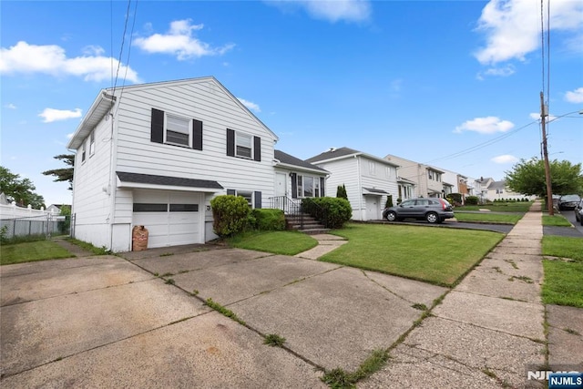 3 Gregory Ter, Belleville, NJ 07109 - view of front of house with concrete driveway, a garage, and a residential view