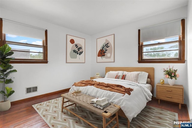 3 Gregory Ter, Belleville, NJ 07109 - bedroom featuring multiple windows, wood finished floors, and baseboards