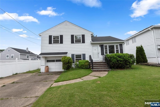 3 Gregory Ter, Belleville, NJ 07109 - tri-level home featuring concrete driveway, roof with shingles, and a garage