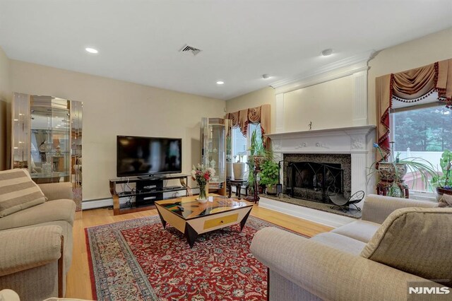 245 Forest Ave, Emerson, NJ 07630 - living room featuring light wood-style floors, a fireplace, and recessed lighting