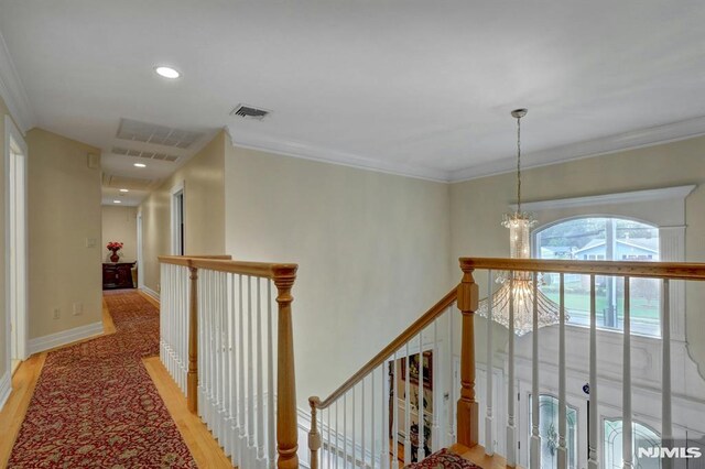 245 Forest Ave, Emerson, NJ 07630 - hallway with an upstairs landing, a chandelier, light wood-type flooring, recessed lighting, and baseboards