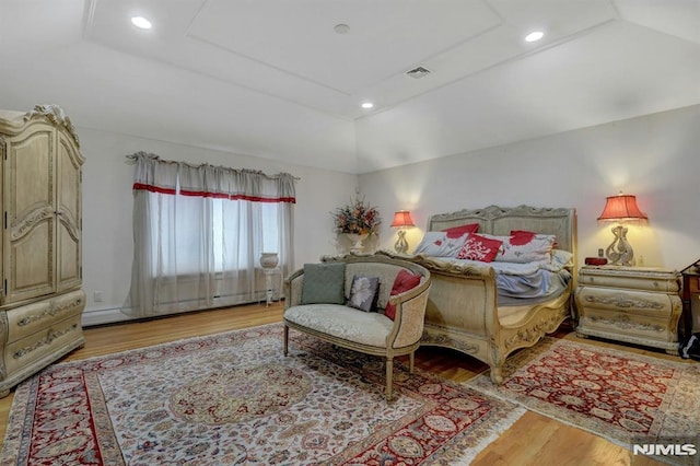245 Forest Ave, Emerson, NJ 07630 - bedroom with light wood-style floors and vaulted ceiling