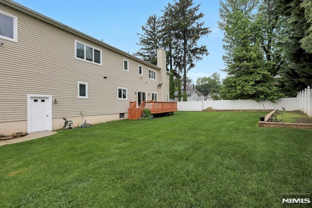 245 Forest Ave, Emerson, NJ 07630 - view of yard featuring a wooden deck and a vegetable garden