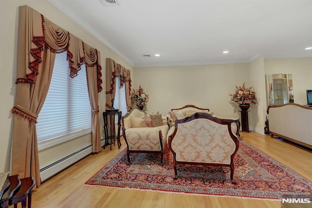 245 Forest Ave, Emerson, NJ 07630 - bedroom with a baseboard heating unit, wood finished floors, recessed lighting, crown molding, and baseboards