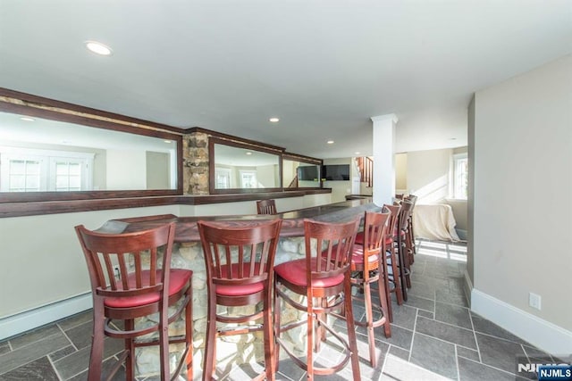 1 Brook Valley Ter, Kinnelon Borough, NJ 07405 - dining room with a dry bar, healthy amount of natural light, recessed lighting, baseboards, and a baseboard heating unit