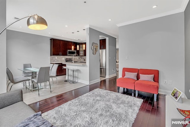 274 Roslyn Ct, West New York, NJ 07093 - living room featuring crown molding, light wood-style floors, recessed lighting, and baseboards