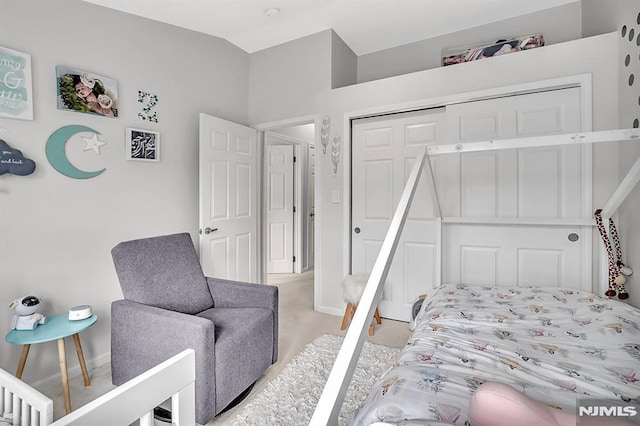 274 Roslyn Ct, West New York, NJ 07093 - bedroom featuring a closet, light colored carpet, and baseboards