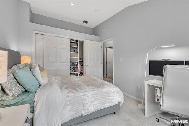 274 Roslyn Ct, West New York, NJ 07093 - bedroom with vaulted ceiling, a closet, light carpet, and baseboards