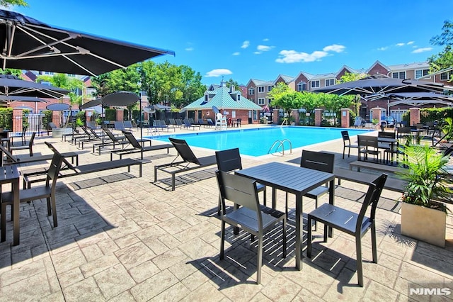 274 Roslyn Ct, West New York, NJ 07093 - community pool featuring a patio area