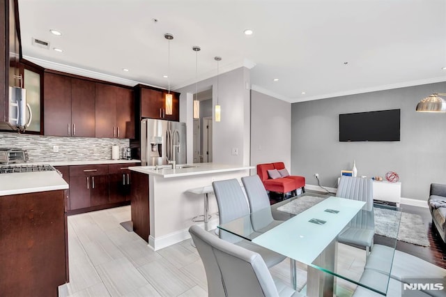 274 Roslyn Ct, West New York, NJ 07093 - dining room with crown molding, recessed lighting, and baseboards