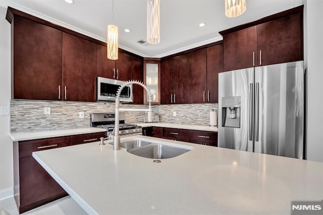 274 Roslyn Ct, West New York, NJ 07093 - kitchen featuring appliances with stainless steel finishes, light countertops, decorative backsplash, decorative light fixtures, and recessed lighting
