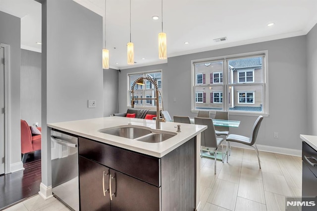 274 Roslyn Ct, West New York, NJ 07093 - kitchen featuring stainless steel dishwasher, a sink, light countertops, dark brown cabinetry, and ornamental molding