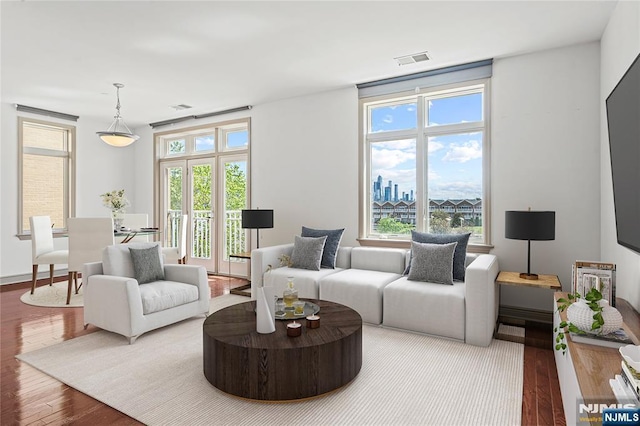 7400 River Rd Unit 304, North Bergen, NJ 07047 - living area with wood finished floors and plenty of natural light