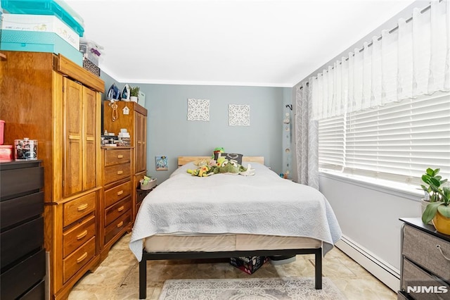 89 Westminster Pl, Garfield, NJ 07026 - bedroom with a baseboard heating unit