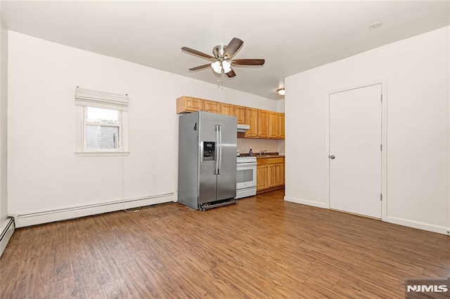 89 Westminster Pl, Garfield, NJ 07026 - kitchen with stainless steel fridge, white range with gas stovetop, ceiling fan, and light wood-style floors