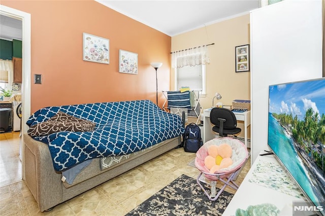 89 Westminster Pl, Garfield, NJ 07026 - bedroom with crown molding, an office area, and washer / clothes dryer