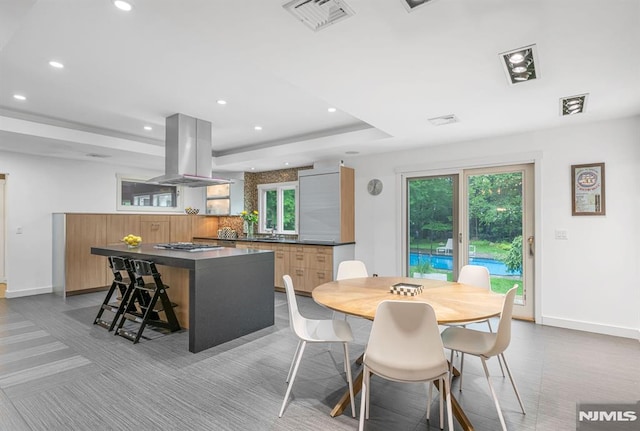 275 Gregory Rd, Franklin Lakes, NJ 07417 - dining area featuring a tray ceiling, recessed lighting, and baseboards