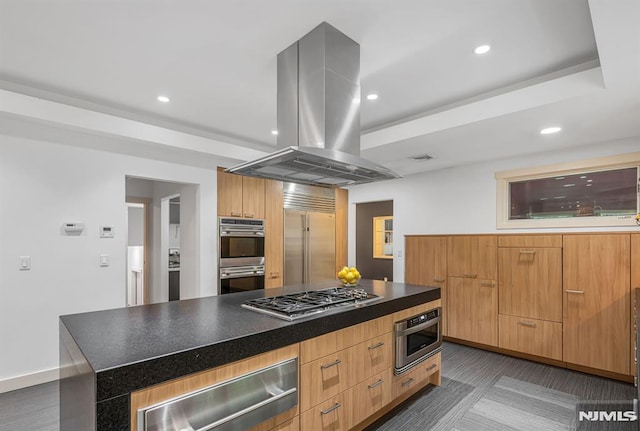 275 Gregory Rd, Franklin Lakes, NJ 07417 - kitchen with island exhaust hood, stainless steel appliances, modern cabinets, a warming drawer, and dark countertops