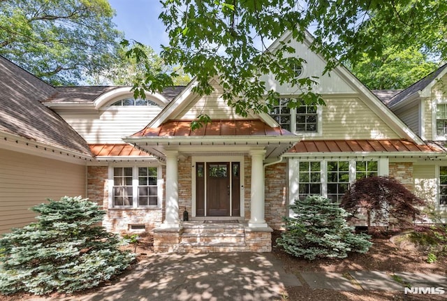 275 Gregory Rd, Franklin Lakes, NJ 07417 - doorway to property featuring a standing seam roof and metal roof