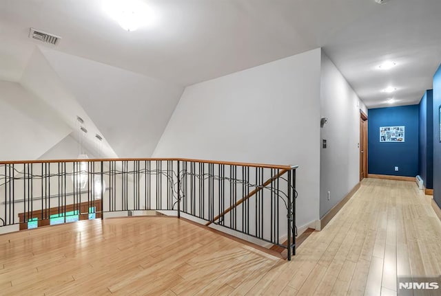 275 Gregory Rd, Franklin Lakes, NJ 07417 - hall featuring an upstairs landing, wood finished floors, and baseboards