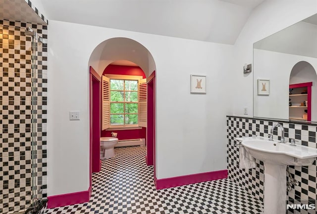 275 Gregory Rd, Franklin Lakes, NJ 07417 - bathroom featuring toilet, a baseboard heating unit, tile patterned floors, and vaulted ceiling