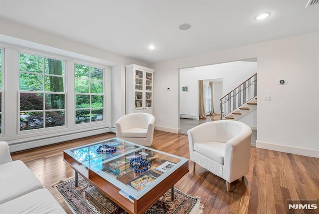 275 Gregory Rd, Franklin Lakes, NJ 07417 - living room with a baseboard radiator, baseboards, stairs, wood finished floors, and recessed lighting