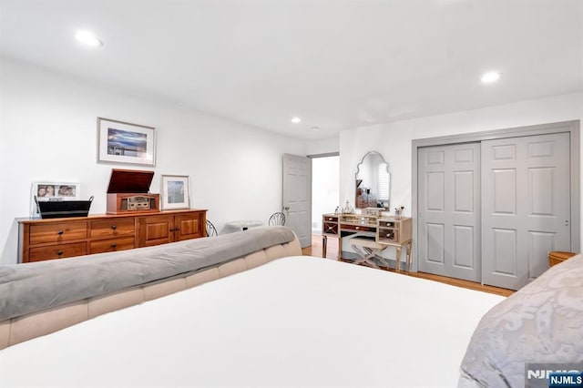 337 Vreeland Ave, Leonia, NJ 07605 - bedroom with recessed lighting, wood finished floors, and a closet