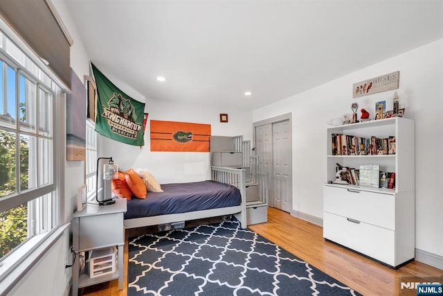 337 Vreeland Ave, Leonia, NJ 07605 - bedroom with light wood-type flooring, recessed lighting, a closet, and baseboards