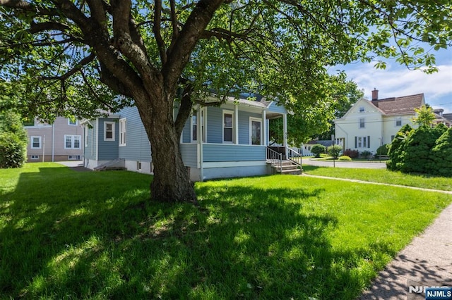 50 Richards Ave, Dover Town, NJ 07801 - view of front of home with a front yard and a porch