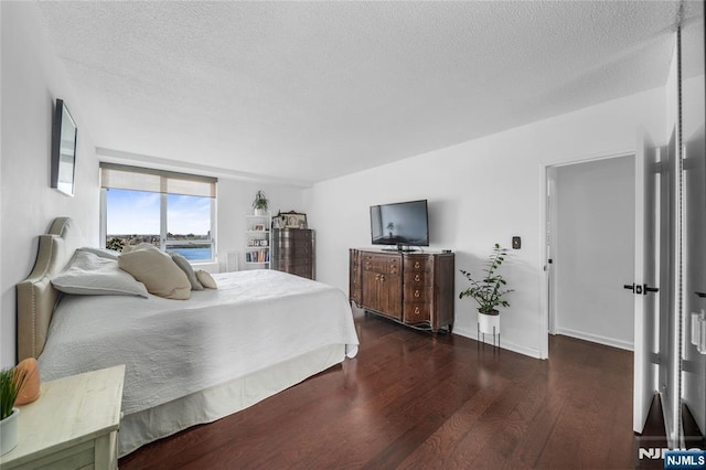 3 Horizon Unit 801, Fort Lee, NJ 07024 - bedroom featuring wood finished floors and a textured ceiling